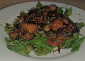 Air-fried chicken pieces with browned edges on a plate for air fryer recipes for beginners