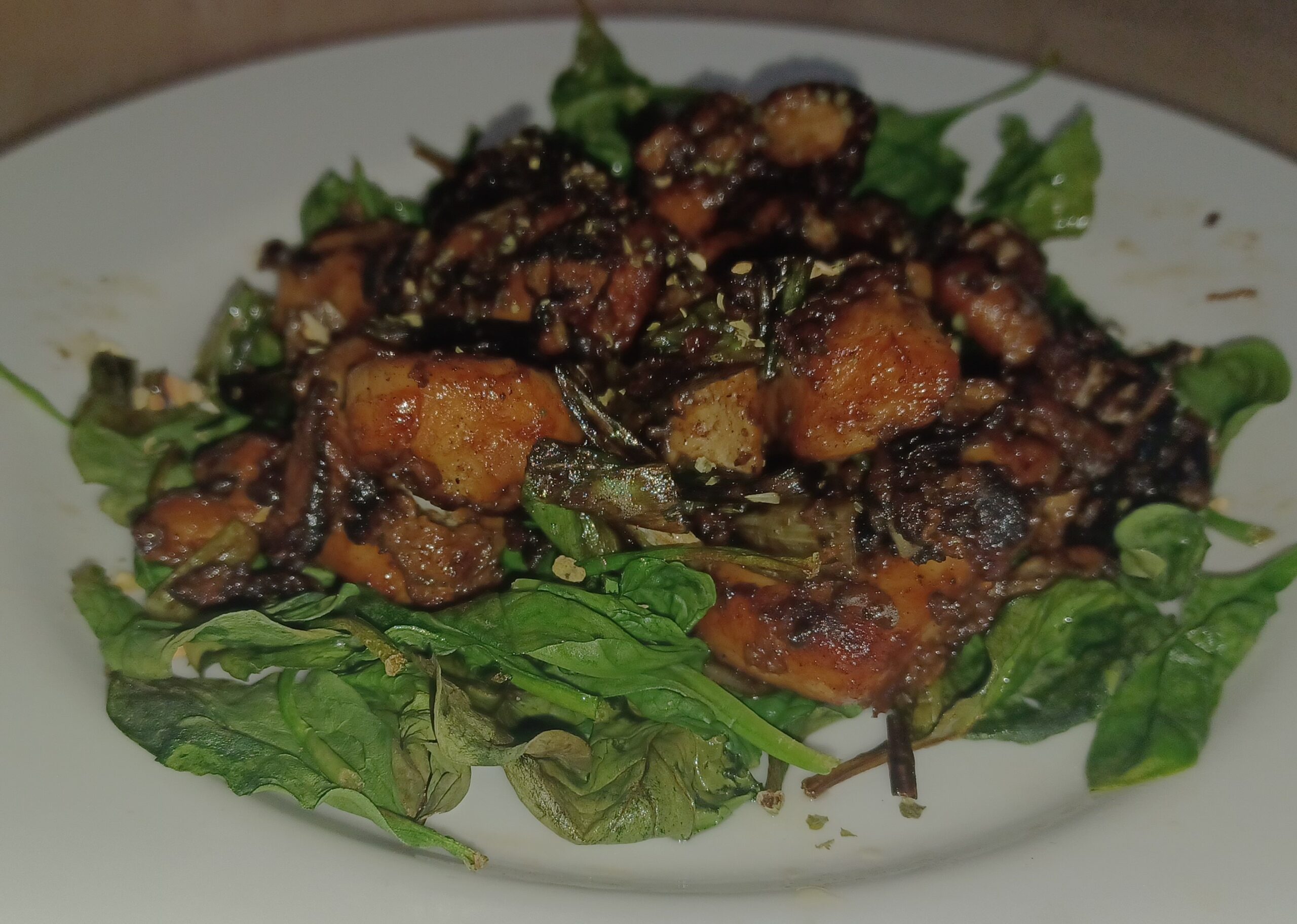 Air-fried chicken pieces with browned edges on a plate for air fryer recipes for beginners