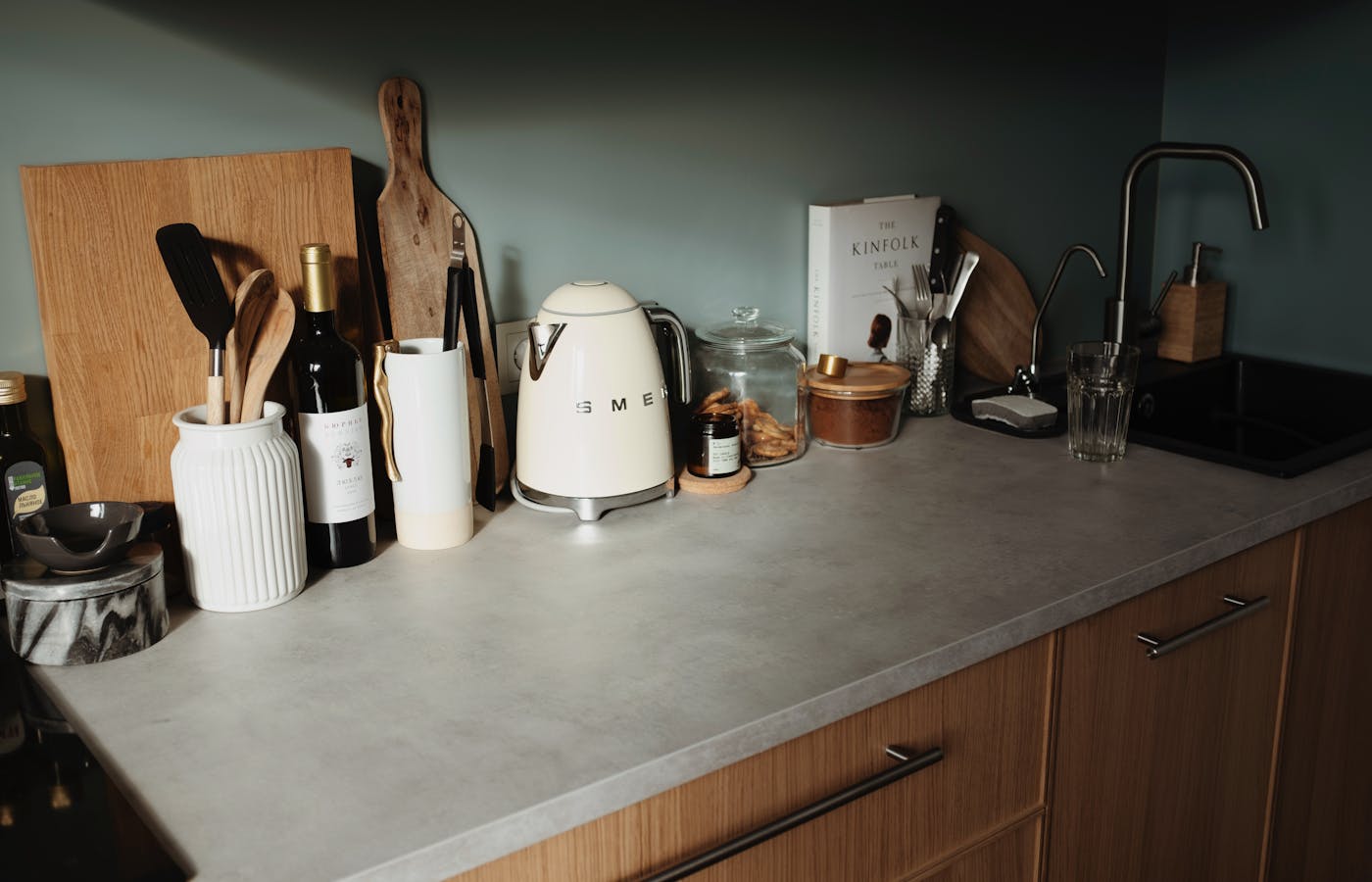 Kitchen counter with utensils and cutting boards