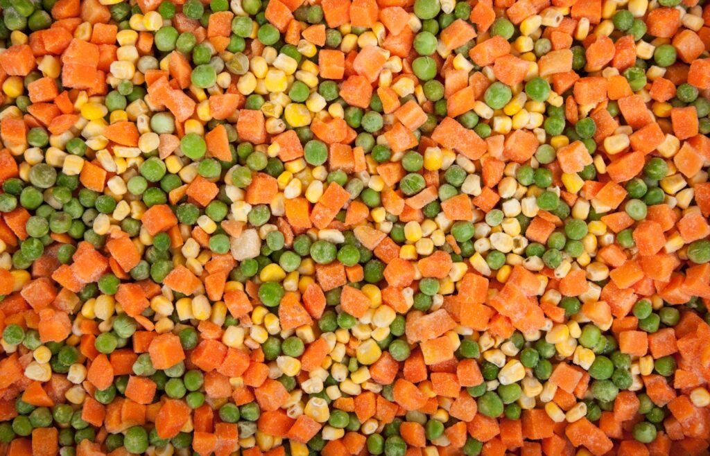 Frozen peas corn and carrots before cooking