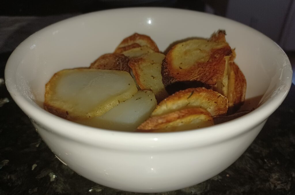 Air fried potato chips on a plate after air fryer cooking