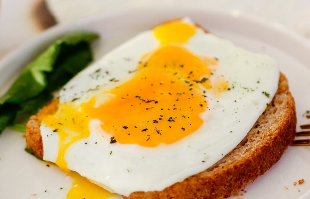 Fried egg on toast with a runny yolk